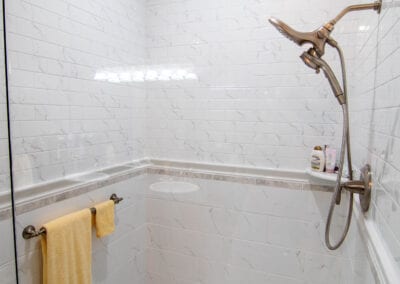 Standing Bathroom with Glass Attached with Marble Flooring