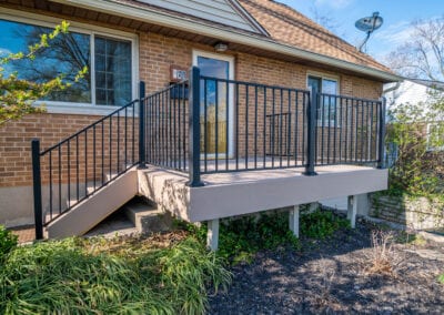 Cream Colored and Iron Fenced Deck Modeling